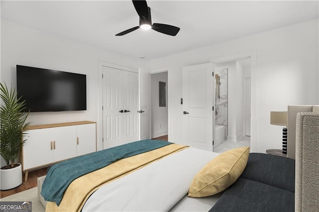 1835 Hawkins St, Smyrna, GA 30080 - bedroom featuring ensuite bath, wood finished floors, a closet, and a ceiling fan