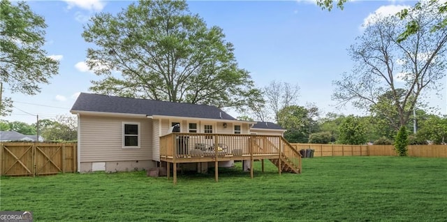 1835 Hawkins St, Smyrna, GA 30080 - rear view of house featuring a wooden deck, a yard, a fenced backyard, and stairway