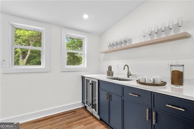 1835 Hawkins St, Smyrna, GA 30080 - bar with wine cooler, a sink, wet bar, baseboards, and light wood-style floors