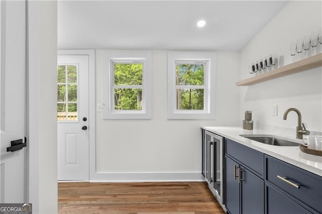 1835 Hawkins St, Smyrna, GA 30080 - bar with recessed lighting, wood finished floors, baseboards, and a sink