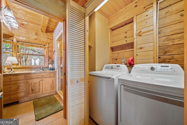 399 Ranch Mountain Dr, Dahlonega, GA 30533 - laundry area featuring laundry area, wood walls, wood ceiling, separate washer and dryer, and light tile patterned floors