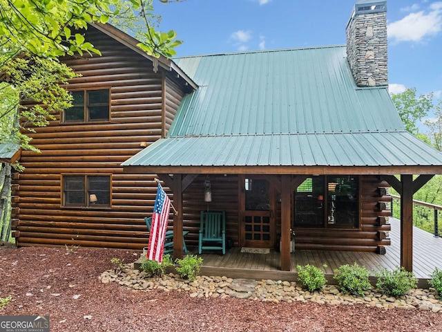 399 Ranch Mountain Dr, Dahlonega, GA 30533 - view of front of property featuring metal roof, a chimney, and log siding
