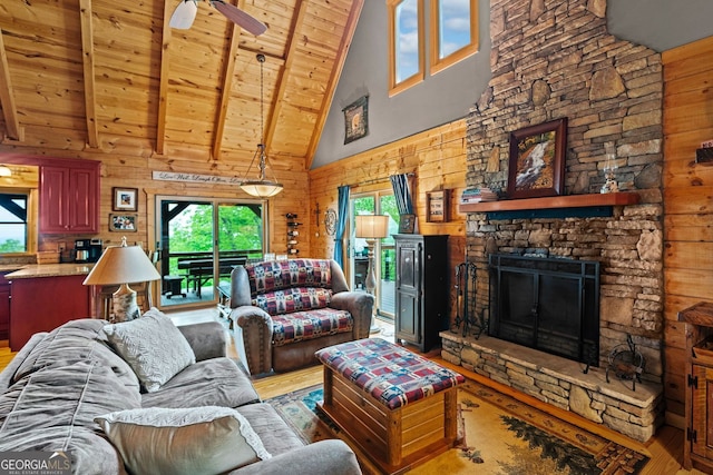 399 Ranch Mountain Dr, Dahlonega, GA 30533 - living room with high vaulted ceiling, plenty of natural light, wood walls, and wood finished floors