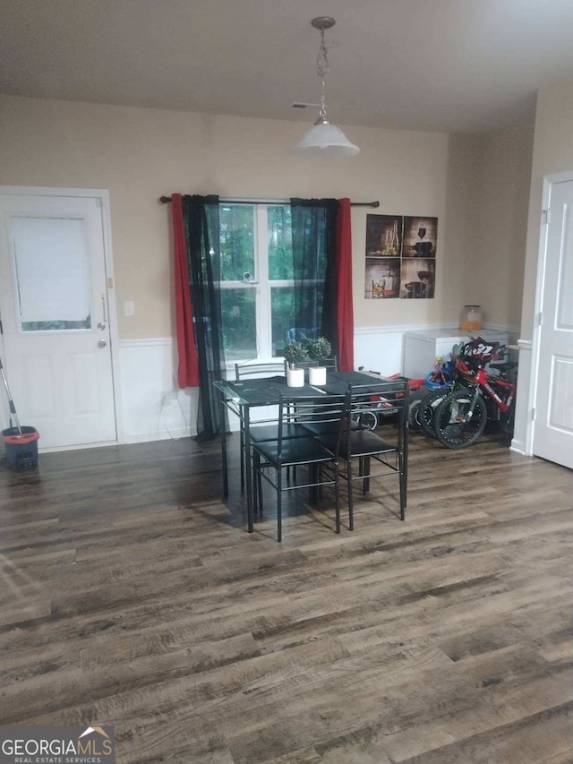 dining room with wood finished floors