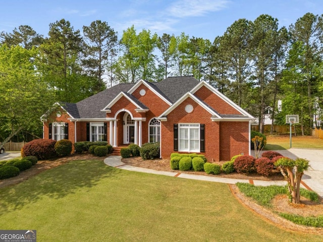 500 Meadowmeade Ln, Lawrenceville, GA 30043 - traditional-style house featuring brick siding and roof with shingles