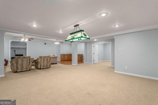 500 Meadowmeade Ln, Lawrenceville, GA 30043 - unfurnished living room featuring light carpet, recessed lighting, a ceiling fan, and ornamental molding