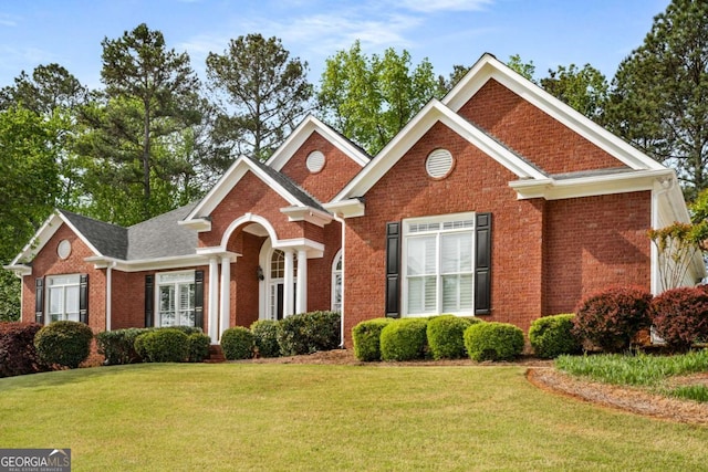 500 Meadowmeade Ln, Lawrenceville, GA 30043 - view of front facade with brick siding and a front yard