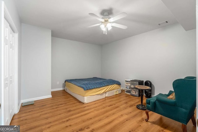 500 Meadowmeade Ln, Lawrenceville, GA 30043 - bedroom featuring light wood finished floors and ceiling fan