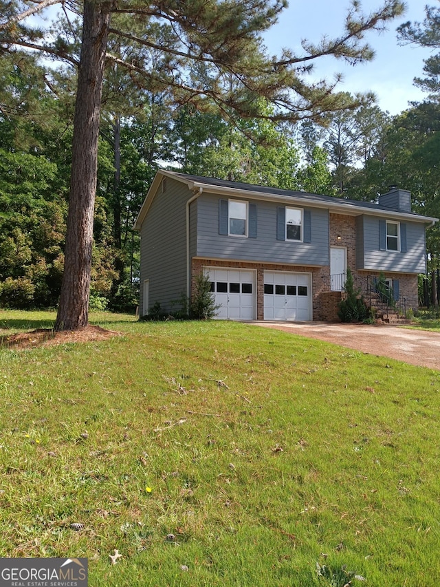 4616 Hamlet Walk SE, Conyers, GA 30094 - bi-level home with brick siding, a garage, driveway, a chimney, and a front yard