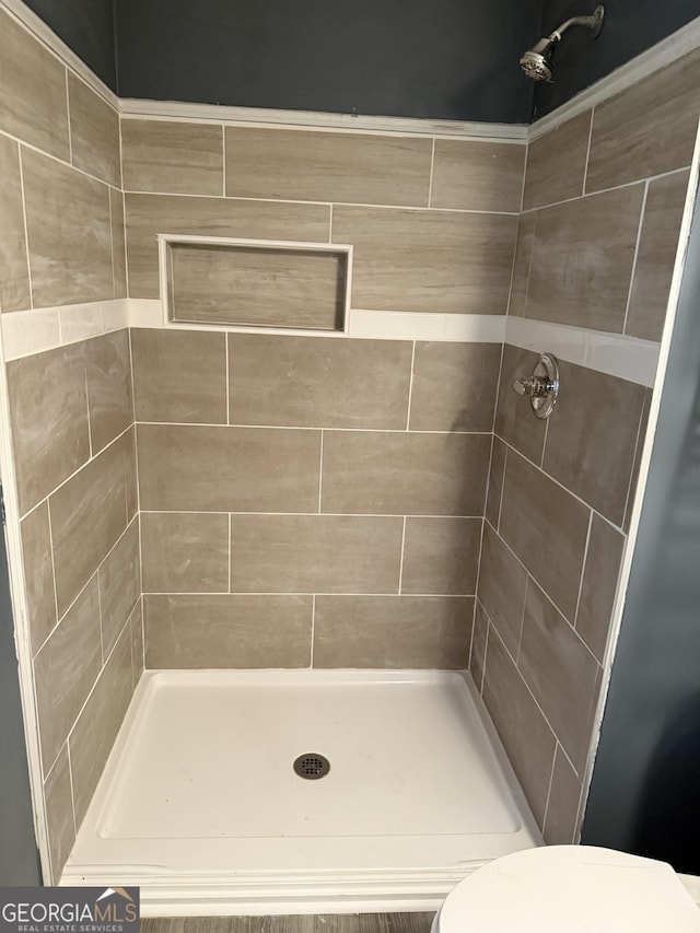 4616 Hamlet Walk SE, Conyers, GA 30094 - bathroom featuring a shower stall and toilet