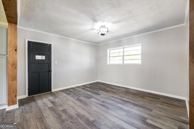 203 N Lake Dr, Brunswick, GA 31525 - interior space featuring a textured ceiling, crown molding, baseboards, and dark wood-style flooring