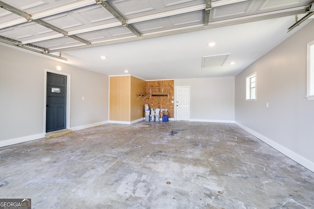 203 N Lake Dr, Brunswick, GA 31525 - garage with baseboards and recessed lighting