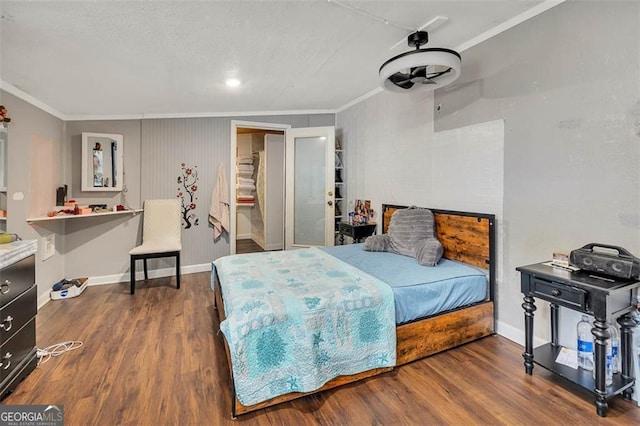 3682 Brantley Ave, Brunswick, GA 31520 - bedroom featuring baseboards, ornamental molding, and dark wood-type flooring