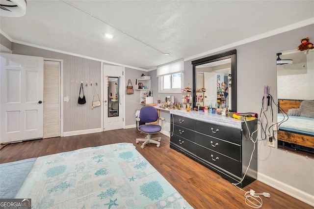 3682 Brantley Ave, Brunswick, GA 31520 - bedroom featuring baseboards, crown molding, and wood finished floors