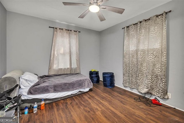 3682 Brantley Ave, Brunswick, GA 31520 - bedroom with wood finished floors, baseboards, and ceiling fan