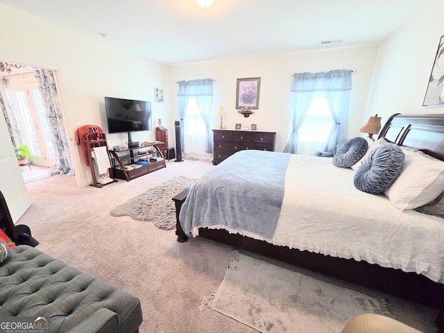 288 Mccall Way, Monroe, GA 30655 - bedroom featuring visible vents, carpet floors, and multiple windows