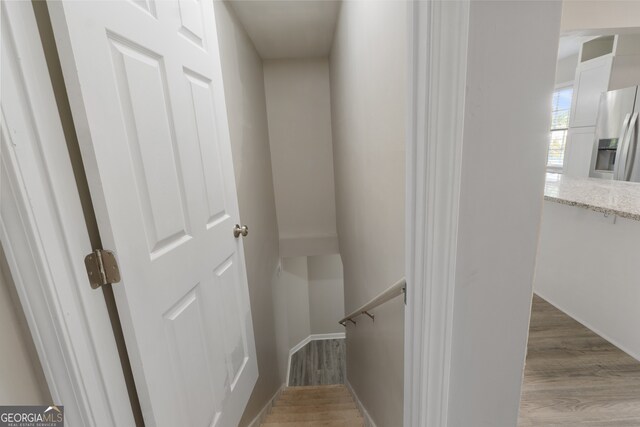 1825 SW Willis Mill Rd, Atlanta, GA 30311 - staircase featuring baseboards and wood finished floors