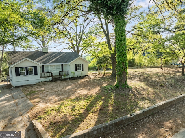 1825 SW Willis Mill Rd, Atlanta, GA 30311 - view of front facade with a shingled roof, a chimney, covered porch, and crawl space