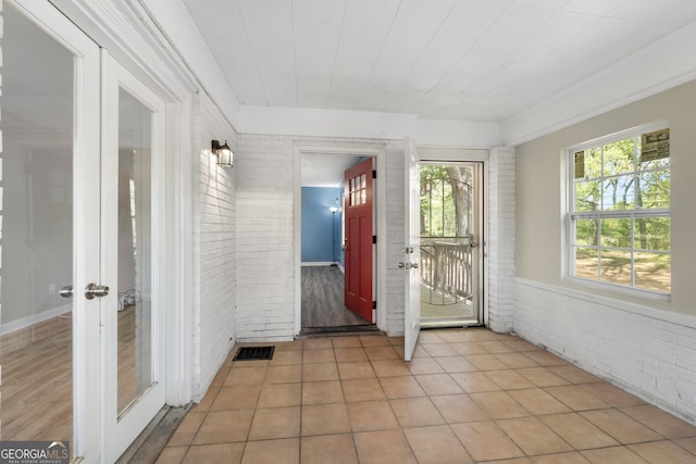 1825 SW Willis Mill Rd, Atlanta, GA 30311 - unfurnished sunroom featuring a healthy amount of sunlight, french doors, and visible vents