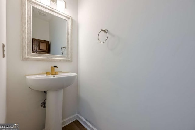 bathroom featuring baseboards