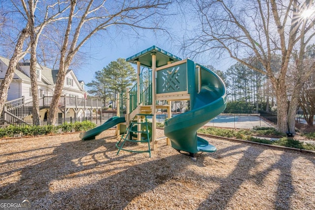 community play area featuring fence