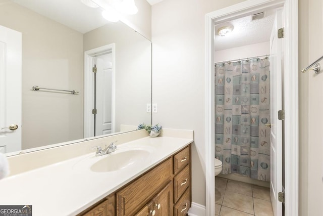 full bathroom featuring vanity, toilet, tile patterned flooring, a shower with shower curtain, and visible vents