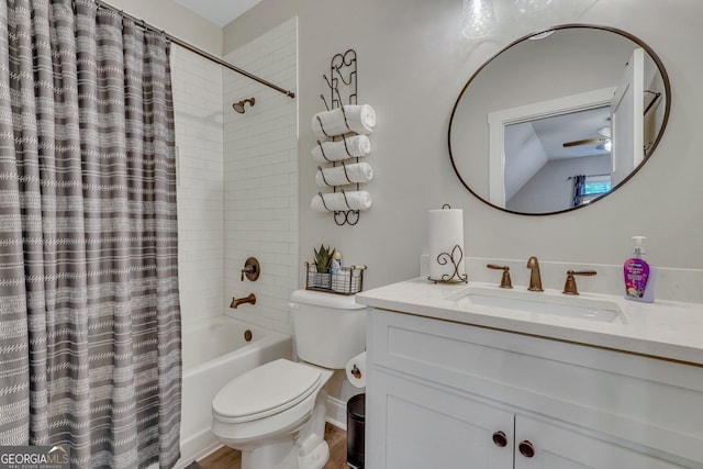 bathroom with shower / tub combo, toilet, and vanity
