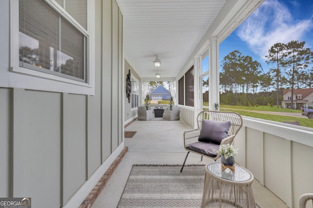 view of patio with a ceiling fan and covered porch