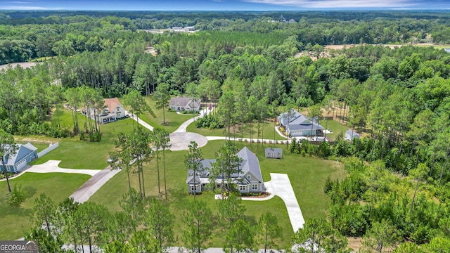 bird's eye view featuring a view of trees