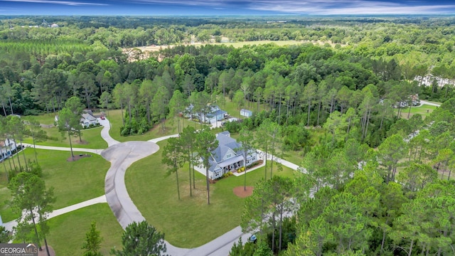 drone / aerial view with a view of trees