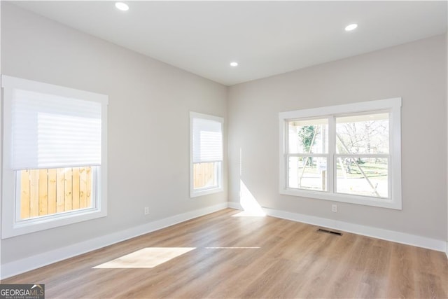 3286 Bachelor St, East Point, GA 30344 - empty room with recessed lighting, visible vents, light wood finished floors, and baseboards