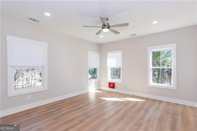 3286 Bachelor St, East Point, GA 30344 - empty room featuring ceiling fan, light wood-style floors, and visible vents