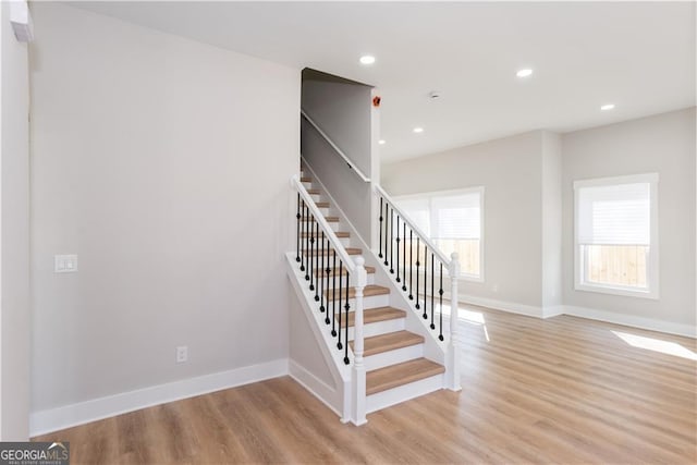 3286 Bachelor St, East Point, GA 30344 - stairs with baseboards, wood finished floors, and recessed lighting