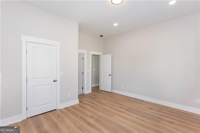 3286 Bachelor St, East Point, GA 30344 - unfurnished bedroom with recessed lighting, light wood-type flooring, and baseboards