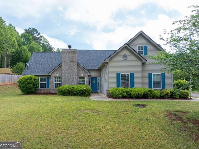180 Laurel Oaks Ln, Jefferson, GA 30549 - traditional-style home with a shingled roof, a chimney, and brick siding