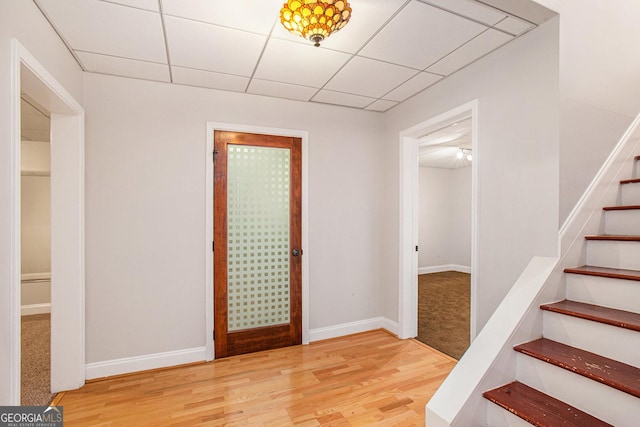 732 Sweet Gum Way, Canton, GA 30115 - foyer entrance featuring wood finished floors, a drop ceiling, baseboards, and stairway