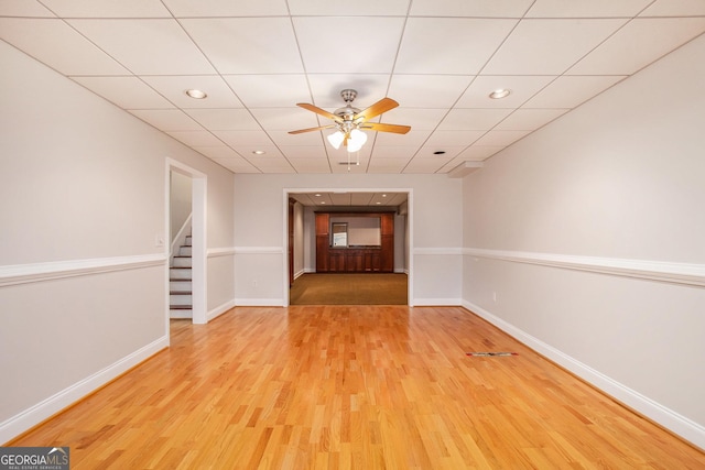 732 Sweet Gum Way, Canton, GA 30115 - spare room with stairway, a ceiling fan, baseboards, and wood finished floors