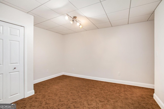 732 Sweet Gum Way, Canton, GA 30115 - basement featuring dark carpet, baseboards, and a paneled ceiling