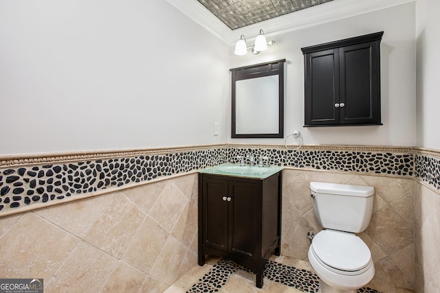 732 Sweet Gum Way, Canton, GA 30115 - half bath featuring toilet, tile walls, wainscoting, vanity, and ornamental molding