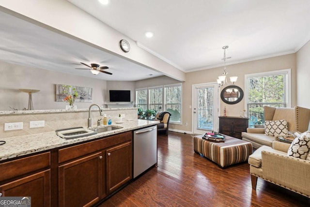 1635 Hampton Oaks Dr, Alpharetta, GA 30004 - kitchen featuring open floor plan, stainless steel dishwasher, a sink, decorative backsplash, and light stone countertops