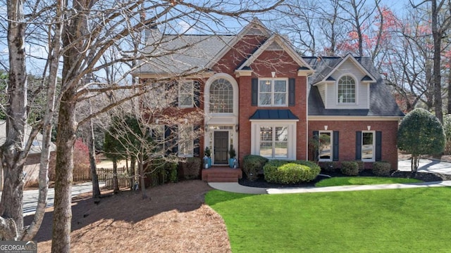 720 Lakeglen Dr, Suwanee, GA 30024 - view of front of home with brick siding and a shingled roof