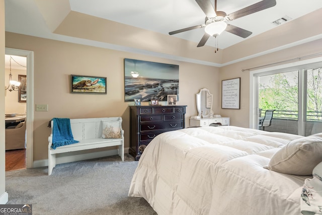 carpeted bedroom featuring ceiling fan, baseboards, access to exterior, and visible vents