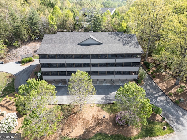 bird's eye view featuring a forest view
