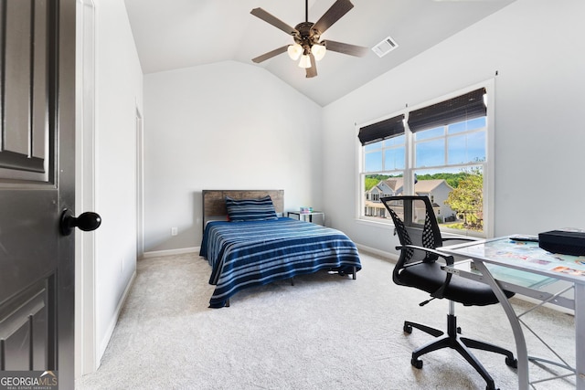 bedroom featuring lofted ceiling, baseboards, light colored carpet, and visible vents