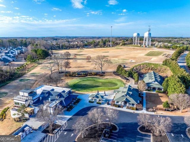 birds eye view of property with a residential view