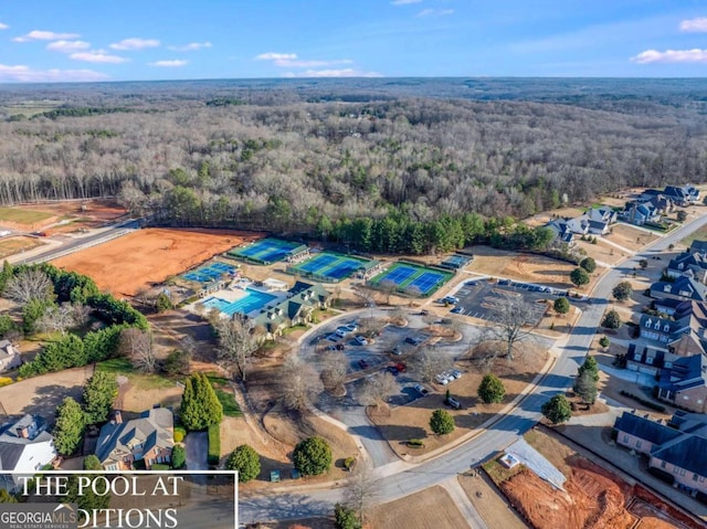 bird's eye view featuring a forest view