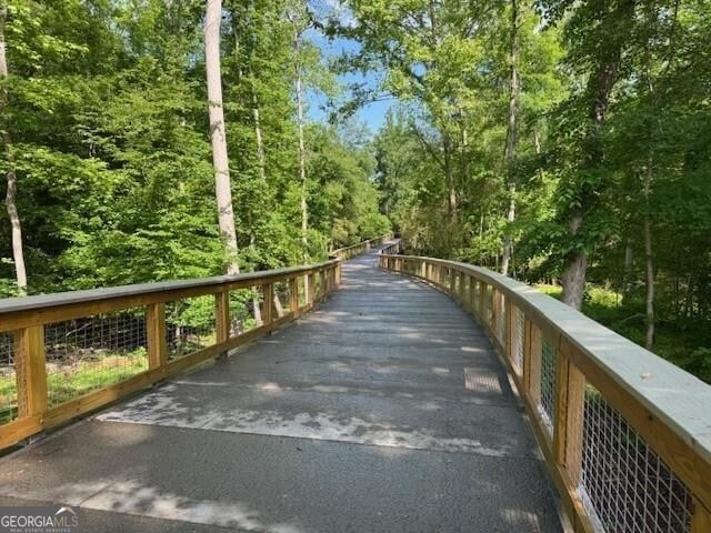 surrounding community with a forest view