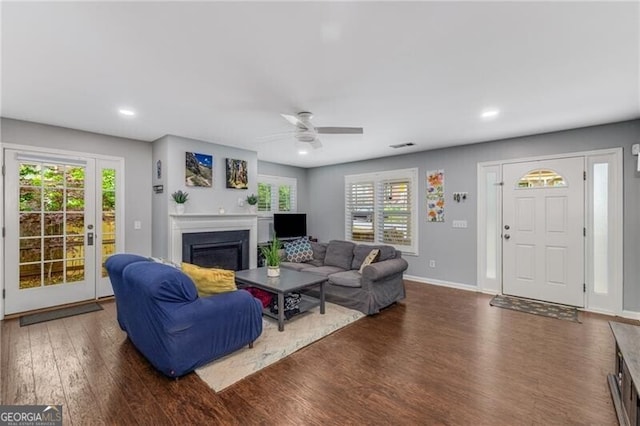 72 Griggs St SW, Marietta, GA 30064 - living room featuring wood finished floors, a glass covered fireplace, recessed lighting, and a ceiling fan