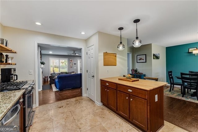 72 Griggs St SW, Marietta, GA 30064 - kitchen with appliances with stainless steel finishes, open shelves, decorative light fixtures, ceiling fan, and recessed lighting