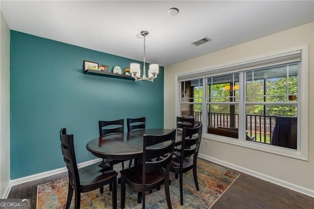 72 Griggs St SW, Marietta, GA 30064 - dining area featuring a chandelier and wood finished floors